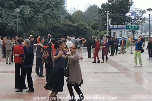 People dancing outside the Sheraton Guiyang