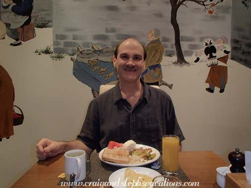 Craig enjoys breakfast at the Red Wall Garden