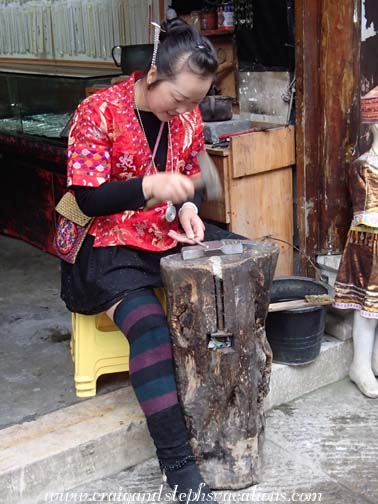 Minority woman doing silverwork