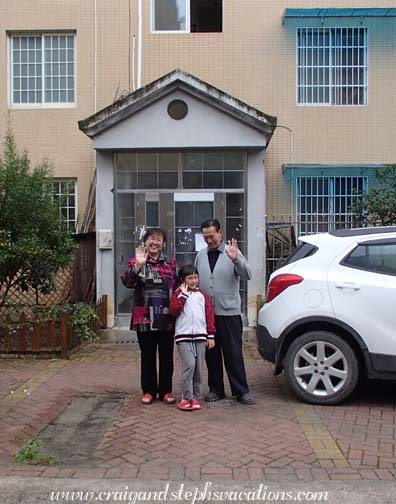 Sara and her grandparents waving goodbye