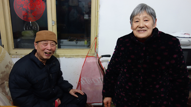 Mr. Zhou's parents: Zhou Xicheng and Liu Guirong