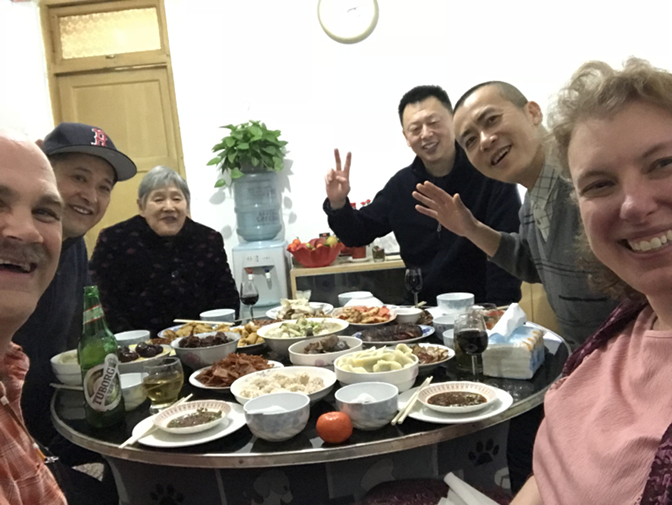 New Year dinner: Craig, 'Mr. Zhou' Shangyi, mother Liu Guirong, brother Zhou Shangsheng, Wang Jun, Steph