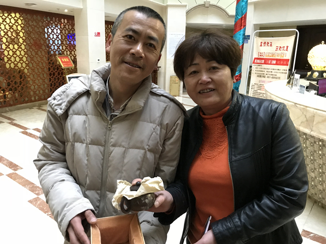 Wang Jun and Xiaohong present us with a purple pottery teapot from Jianshui