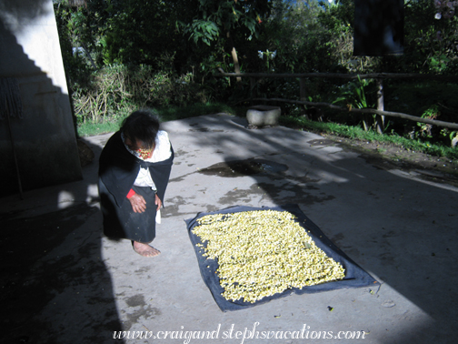 Antonio's mother dries corn in the sun