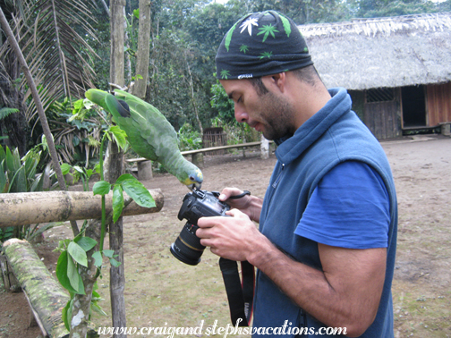 Lorena the parrot checks out Felipe's camera