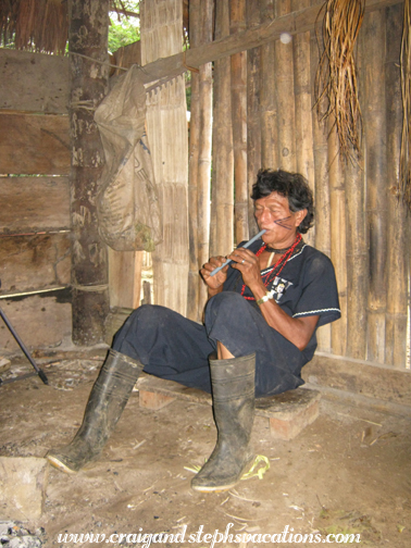 Carlos plays a flute