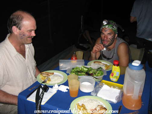 Craig and Felipe enjoy dinner in the mess tent