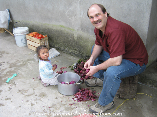 Sisa helps Craig peel onions