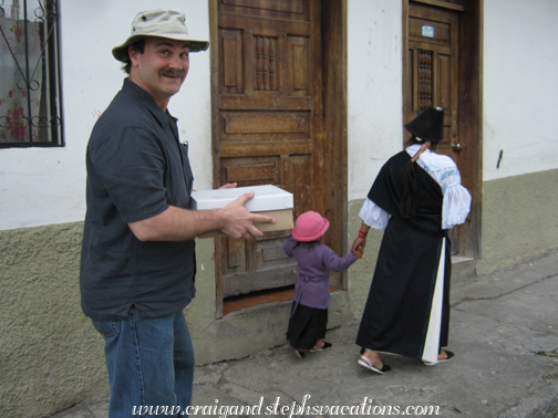 Craig carries the cake