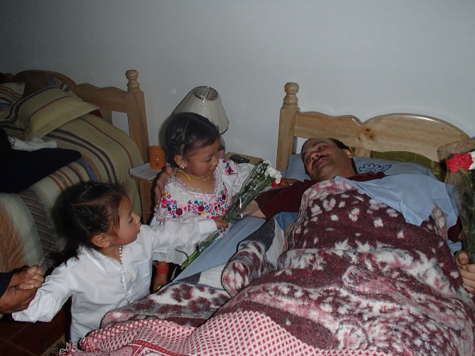 Yupanqui and Sisa present flowers to an under the weather Achi Taita