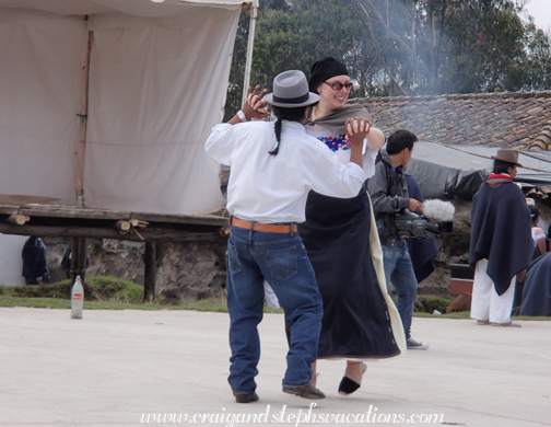 Steph dances with a man from the village