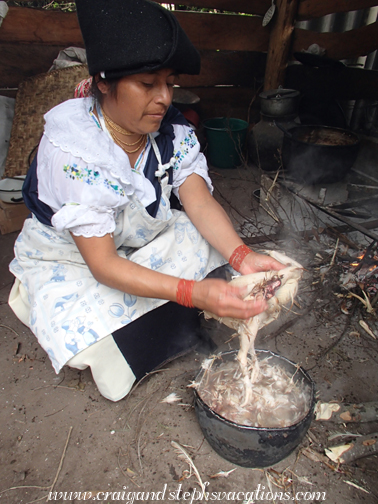 Rosa plucks the hen