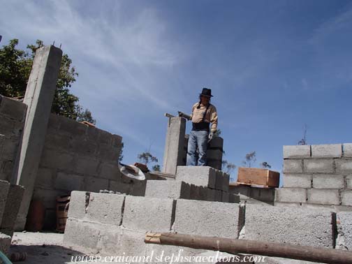 Antonio works on 3rd floor construction