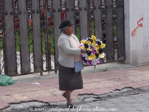 Woman selling wreaths to decorate the cemetery