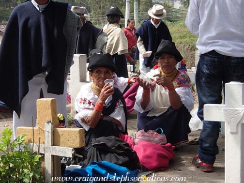 Women eating and drinking in the cemetery