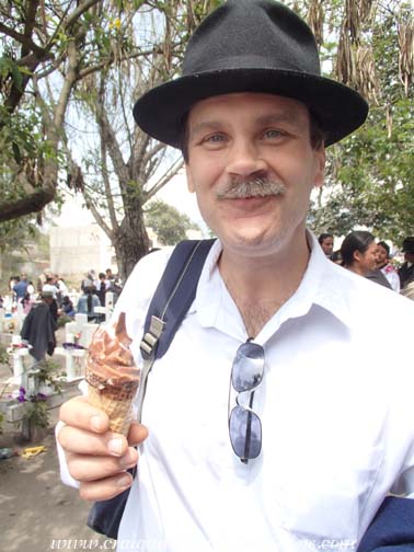 Craig enjoys an ice cream at the cemetery