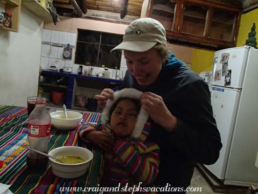 Steph plays with Tayanta at dinner