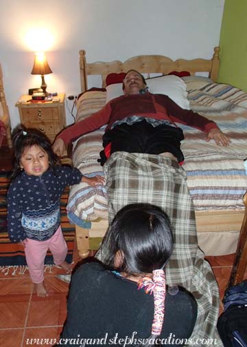 Tayanta oversees as Rosa prepares an herbal bath for Craig's legs