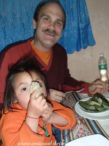 Yupanqui and Craig enjoy sweet potato tamales from Rosa's cooking class