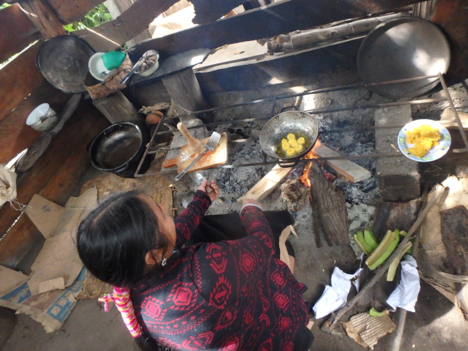 Rosa makes breakfast in the outdoor kitchen