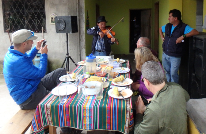 Antonio plays violin for Felipe and the tourists