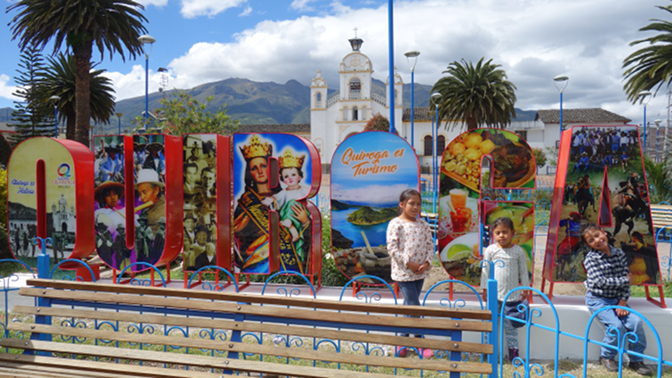 Sisa, Shina, and Yupanqui pose with the brand new Quiroga sign