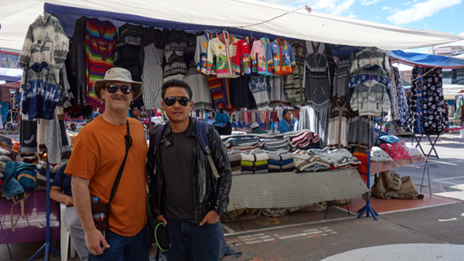 Craig and Sonam at the Plaza de los Ponchos