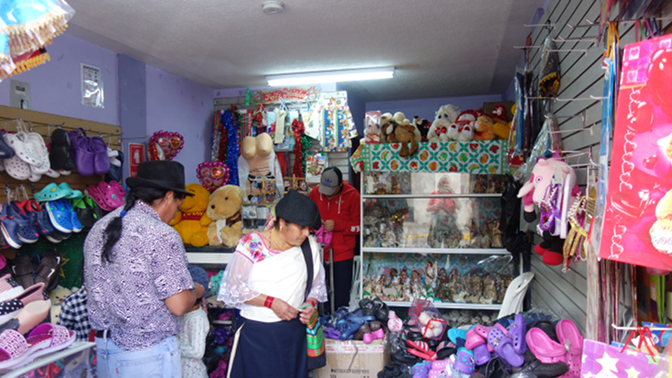 Most eclectic shop ever: featuring plastic shoes, religious statuettes, stuffed animals, balloons, and an S&M themed cooking apron complete with plastic bust (?)