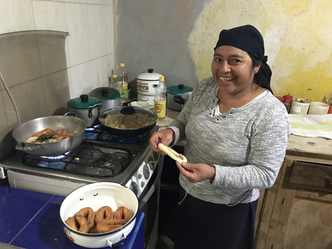 Rosa cooking rosquillas (homemade donuts)