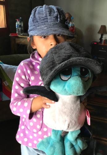 Shina and the Blue Footed Booby wear matching hats