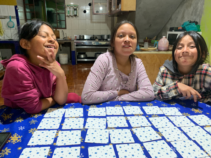 Shina, Sisa, and Yupanqui playing concentration