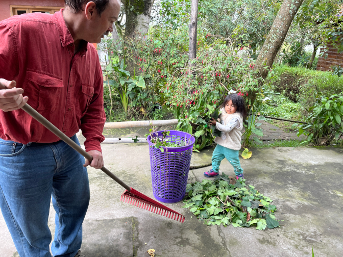 Achi Taita and Nena helping with yard work