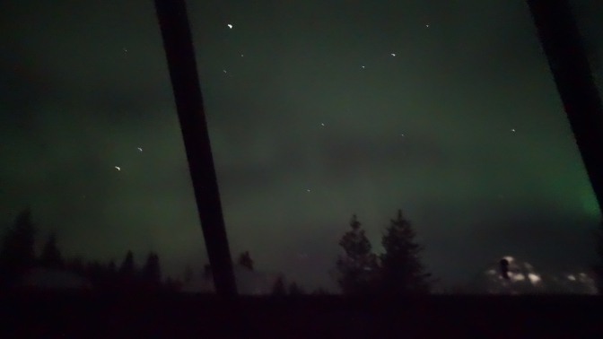 Northern lights viewed from bed in cabin #3