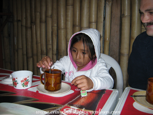 Yasmin drinking tea at Isabela's Restaurant