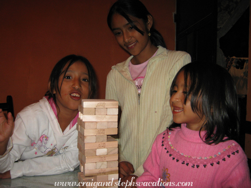 Yasmin, Vanesa,and Aracely play Jenga