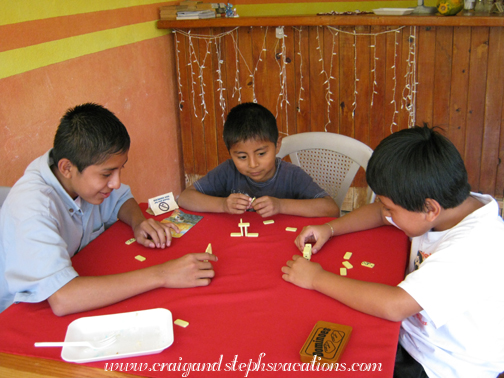 Boys playing dominoes