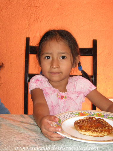 Aracely eating pancakes