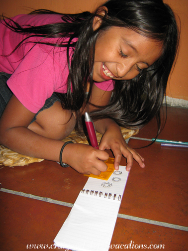 Yasmin plays with spirograph