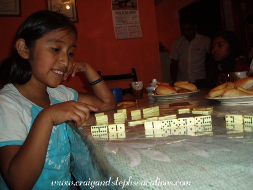 Yasmin playing dominoes