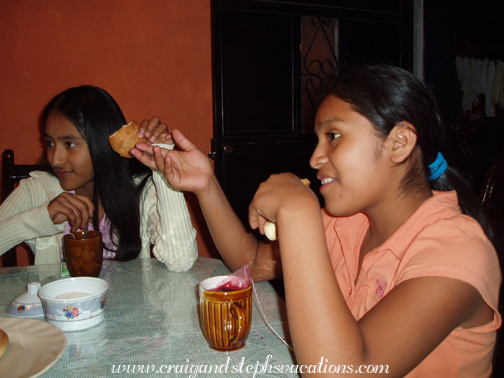 Vanesa and Paola enjoying bread and tea