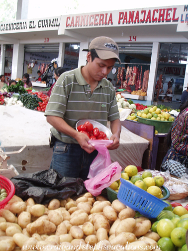 Buying tomatoes at the market