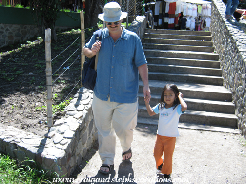 Craig walking with Aracely to the lake