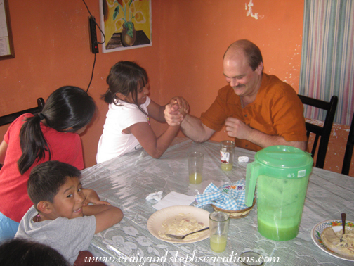 Yasmin arm wrestles with Craig