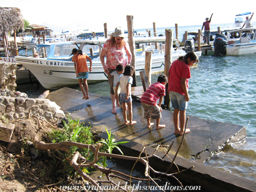 Yoselin, Steph, Eddy, Aracely, Josue, and Yasmin on the jetty