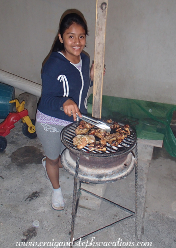 Paola tends the grill