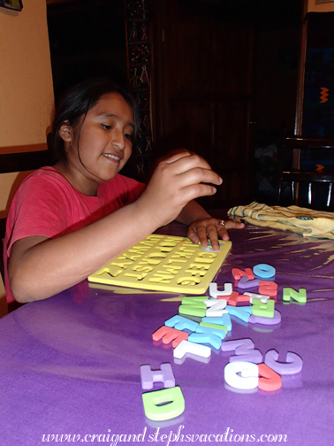 Yasmin plays with the puzzle