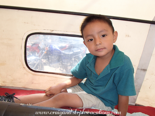 Eddy in the back of Carlos' tuk-tuk