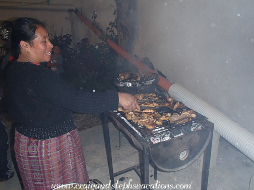 Estela grills the chicken