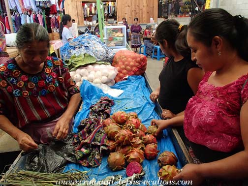 Paulina buys pitaya at the market