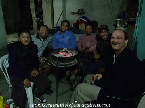 Junior, Juan Carlos, Yolanda, Paulina, Humberto, and Craig around the grill